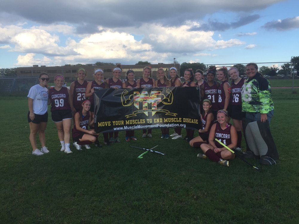   Muscle Champion, Rhiannon Downey (left), and the Concord Field Hockey Team   